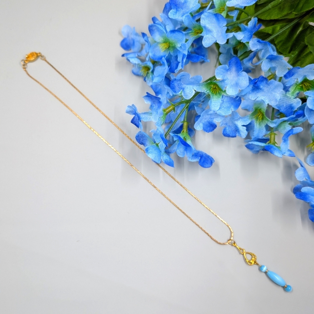 Vintage Y2K Gold Plated Chain Necklace With Blue Simulated Cats Eye Pendant